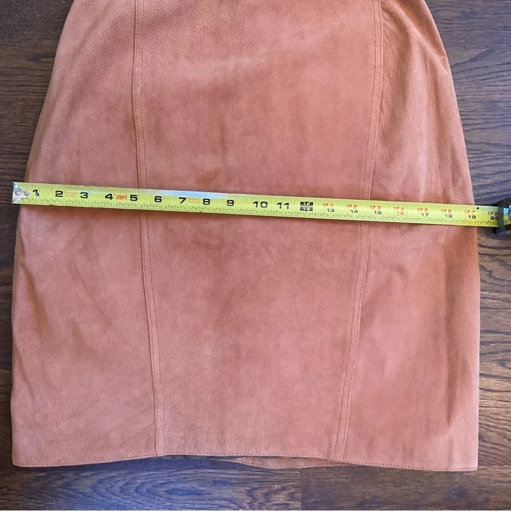 True vintage suede—real leather with clean tailoring an earlier designer era.